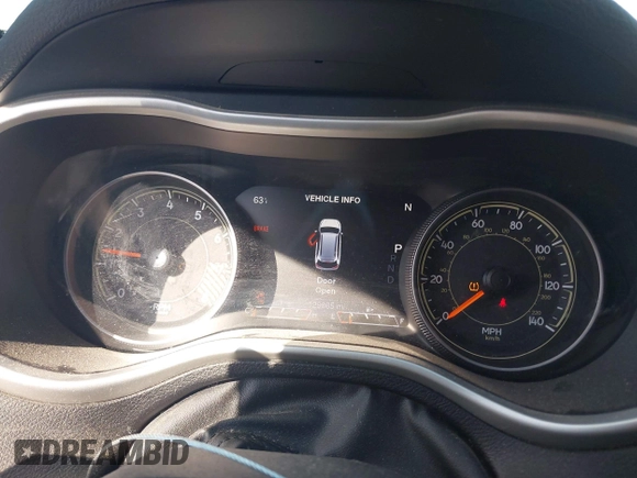 2015 Jeep Cherokee Trailhawk with VIN 1C4PJMBS4FW556822, listed as a IAAI auction lot 42412874 with 129,865 mi miles and . Bid and sale history available at DreamBid. Image 15.