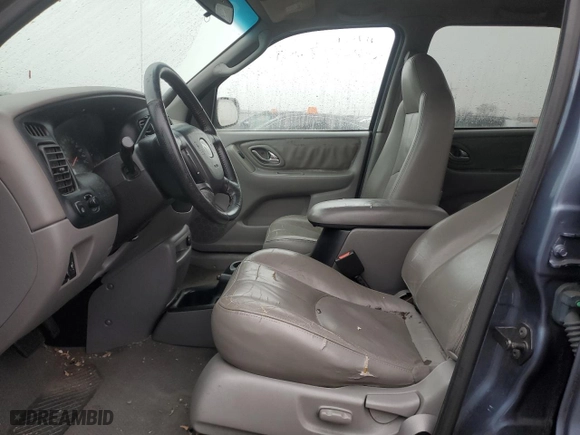 2001 Mazda Tribute LX with VIN 4F2YU09101KM22133, listed as a Copart auction lot 84488134 with 212,157 mi miles and Salvage Title. Bid and sale history available at carsss.com. Image 7.