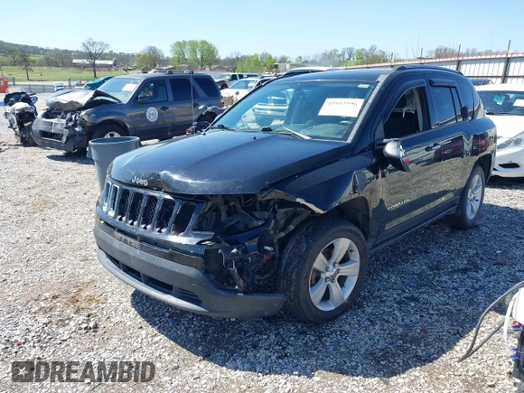 2014 Jeep Compass Sport with VIN 1C4NJCBA0ED510942, listed as a IAAI auction lot 41952596 with 196,030 mi miles and . Bid and sale history available at DreamBid. Image 2.