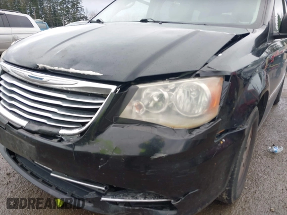 2012 Chrysler Town & Country Touring z VIN 2C4RC1BG7CR308730, wystawiony jako IAAI lot #41868726 z przebiegiem 250 606 mil mil oraz . Historia ofert i sprzedaży dostępna na DreamBid. Obrazek 6.