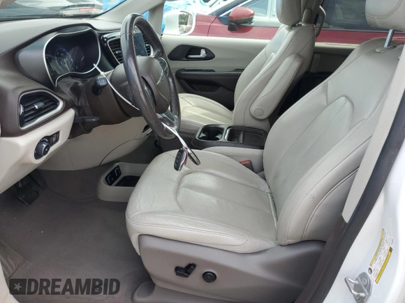 2020 Chrysler Pacifica Touring L with VIN 2C4RC1BGXLR128514, listed as a Copart auction lot 57333635 with 71,109 mi miles and Salvage title. Bid and sale history available at DreamBid. Image 7.