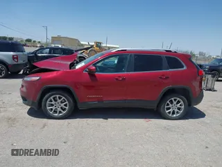 2017 Jeep Cherokee Latitude with VIN 1C4PJLCBXHW661148, listed as a IAAI auction lot 42146384 with 136,391 mi miles and . Bid and sale history available at DreamBid. Image 14.