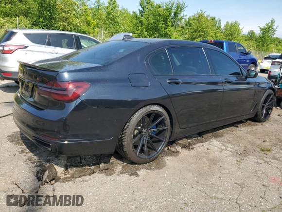 2016 BMW 7 Series 740i with VIN WBA7E2C56GG738788, listed as a Copart auction lot 60654015 with 96,059 mi miles and Clean title. Bid and sale history available at DreamBid. Image 3.