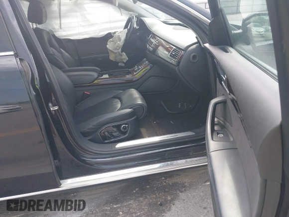2015 Audi A8 4.0T with VIN WAU32AFD6FN002710, listed as a IAAI auction lot 42447149 with 109,791 mi miles and . Bid and sale history available at DreamBid. Image 5.