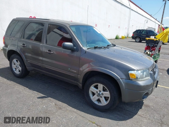 2006 Ford Escape Hybrid z VIN 1FMCU96H86KA52519, wystawiony jako IAAI lot #42443003 z przebiegiem 162 469 mil mil oraz . Historia ofert i sprzedaży dostępna na DreamBid. Obrazek 1.