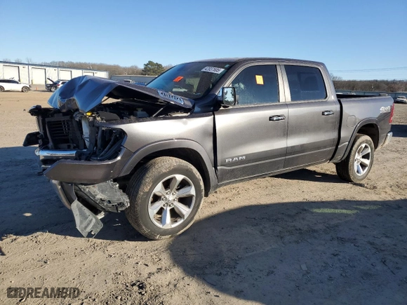 2021 Ram 1500 Laramie with VIN 1C6SRFJTXMN665384, listed as a Copart auction lot 42037685 with 76,836 mi miles and Salvage Title. Bid and sale history available at carsss.com. Image 1.