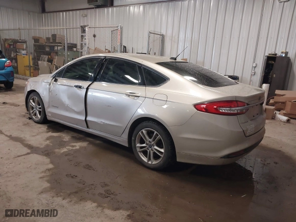 2018 Ford Fusion Hybrid S with VIN 3FA6P0UU5JR100377, listed as a IAAI auction lot 41300284 with 108,936 mi miles. Bid and sale history available at carsss.com. Image 3.