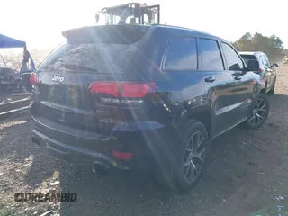 2017 Jeep Grand Cherokee SRT with VIN 1C4RJFDJ3HC694736, listed as a IAAI auction lot 41292771 with 79,966 mi miles. Bid and sale history available at carsss.com. Image 4.