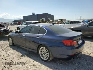 2013 BMW 5 Series 535i xDrive with VIN WBAFU7C52DDU76017, listed as a Copart auction lot 57461795 with 160,417 mi miles and Salvage title. Bid and sale history available at DreamBid. Image 2.