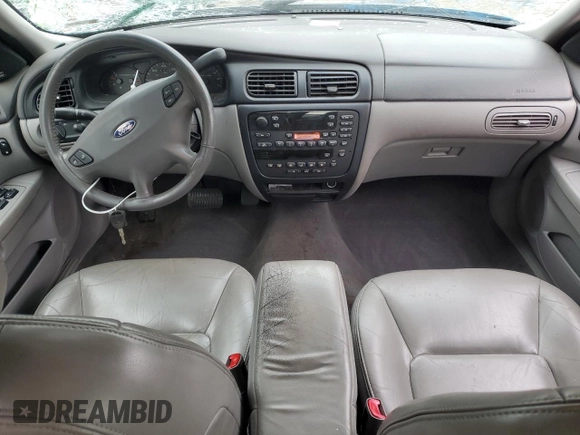 2000 Ford Taurus SEL with VIN 1FAFP56S2YG160062, listed as a Copart auction lot 82297744 with 97,218 mi miles and Salvage title. Bid and sale history available at DreamBid. Image 8.