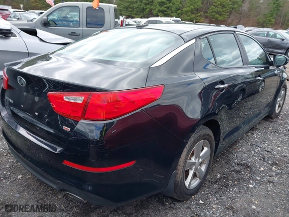 2015 Kia Optima LX with VIN 5XXGM4A75FG465435, listed as a IAAI auction lot 41738703 with 196,915 mi miles. Bid and sale history available at carsss.com. Image 4.