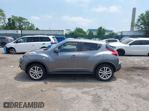 2014 Nissan Juke SL with VIN JN8AF5MV3ET359021, listed as a IAAI auction lot 42602201 with 99,332 mi miles and . Bid and sale history available at DreamBid. Image 14.