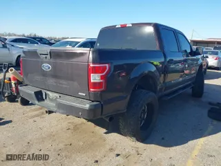 2018 Ford F-150 XL with VIN 1FTEW1CP8JKC49400, listed as a IAAI auction lot 41712598 with 103,017 mi miles. Bid and sale history available at carsss.com. Image 4.
