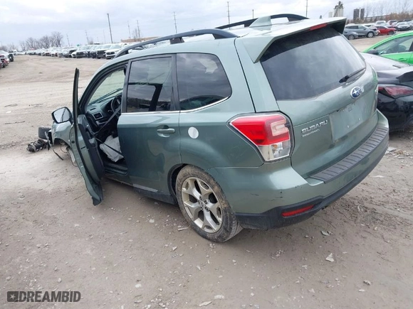 2017 Subaru Forester Touring with VIN JF2SJATC1HH517582, listed as a IAAI auction lot 41710840 with 81,920 mi miles. Bid and sale history available at carsss.com. Image 3.