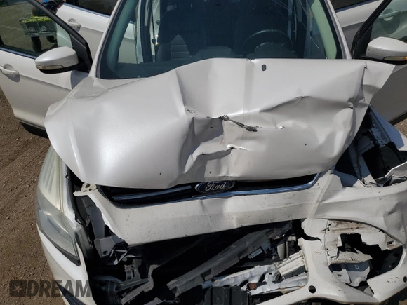 2013 Ford Escape SEL with VIN 1FMCU0HX4DUA84806, listed as a Copart auction lot 62593805 with 107,147 mi miles and Salvage title. Bid and sale history available at DreamBid. Image 12.