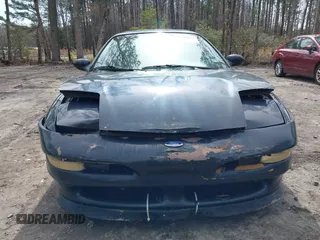 1995 Ford Probe z VIN 1ZVLT22B1S5104093, wystawiony jako IAAI lot #41744654 z przebiegiem 166 253 mil mil oraz . Historia ofert i sprzedaży dostępna na DreamBid. Obrazek 6.