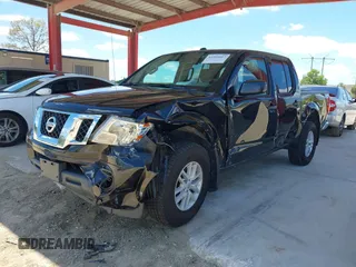 2018 Nissan Frontier SV with VIN 1N6AD0EV1JN732877, listed as a IAAI auction lot 42261667 with 139,686 mi miles and . Bid and sale history available at DreamBid. Image 2.