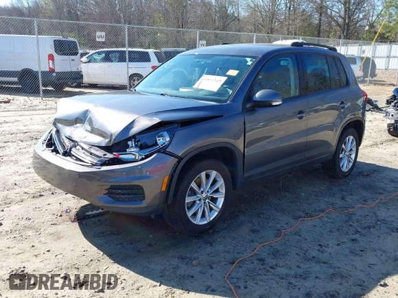 2014 Volkswagen Tiguan SE z VIN WVGAV3AX0EW511694, wystawiony jako IAAI lot #41811345 z przebiegiem 95 129 mil mil oraz . Historia ofert i sprzedaży dostępna na DreamBid. Obrazek 2.