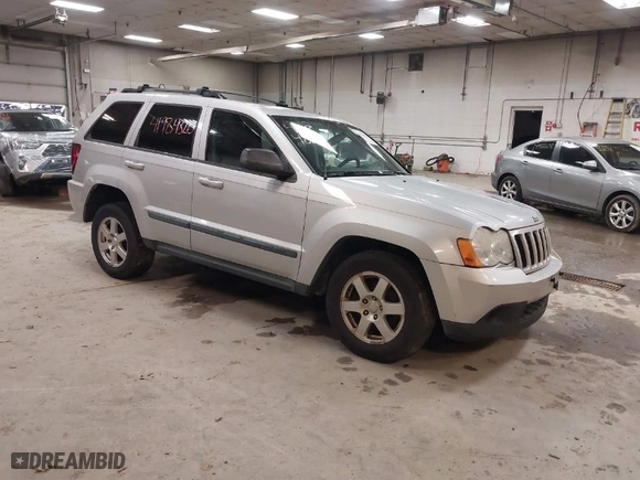 2009 Jeep Grand Cherokee Laredo with VIN 1J8GR48K89C553694, listed as a IAAI auction lot 41984820 with 196,266 mi miles. Bid and sale history available at carsss.com. Image 1.
