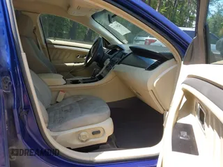 2014 Ford Taurus SE z VIN 1FAHP2D84EG145637, wystawiony jako IAAI lot #42393128 z przebiegiem 264 149 mil mil oraz . Historia ofert i sprzedaży dostępna na DreamBid. Obrazek 5.