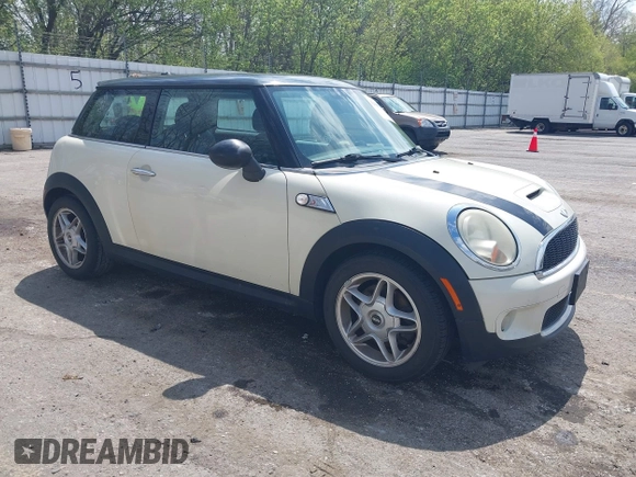 2007 MINI Hardtop S with VIN WMWMF73567TT84033, listed as a IAAI auction lot 42189573 with 75,177 mi miles and . Bid and sale history available at DreamBid. Image 1.