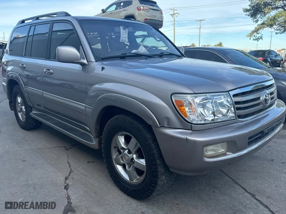 2006 Toyota Land Cruiser with VIN JTEHT05J062080596, listed as a Copart auction lot 80646614 with 242,282 mi miles and Clean Title. Bid and sale history available at carsss.com. Image 1.