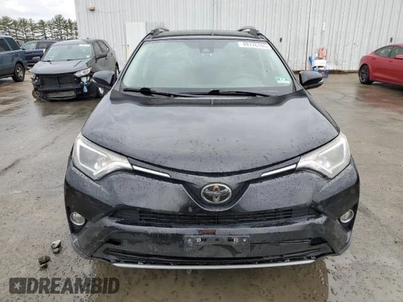 2018 Toyota RAV4 XLE with VIN 2T3RFREVXJW723057, listed as a Copart auction lot 49176705 with 5,980 mi miles and Salvage Title. Bid and sale history available at DreamBid. Image 5.