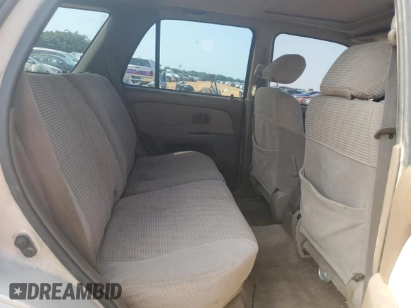 1996 Toyota 4Runner SR5 z VIN JT3HN86R3T0027632, wystawiony jako Copart lot #58767325 z przebiegiem 356 002 mil mil oraz Szkoda całkowita • Salvage title. Historia ofert i sprzedaży dostępna na DreamBid. Obrazek 11.