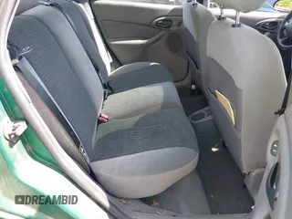 2002 Ford Focus ZX5 z VIN 3FAFP373X2R130965, wystawiony jako IAAI lot #42216638 z przebiegiem 59 236 mil mil oraz . Historia ofert i sprzedaży dostępna na DreamBid. Obrazek 8.
