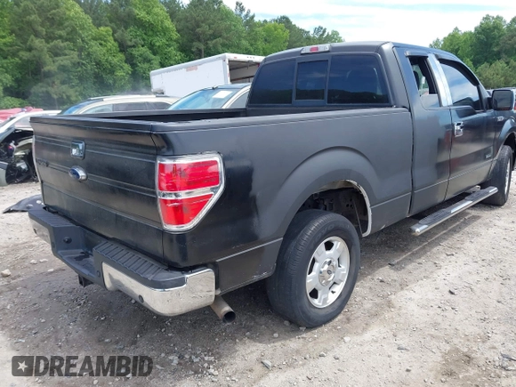 2014 Ford F-150 XL with VIN 1FTFX1CT5EKD34067, listed as a IAAI auction lot 42290888 with 214,507 mi miles and . Bid and sale history available at DreamBid. Image 4.