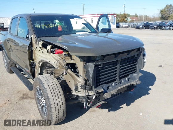 2023 GMC Canyon 4WD AT4 with VIN 1GTP6DEK1P1174713, listed as a IAAI auction lot 41733242 with 35,705 mi miles. Bid and sale history available at carsss.com. Image 6.