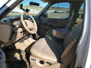1998 Ford F-150 with VIN 1FTZX18W3WNA25682, listed as a Copart auction lot 47494755 with 197,389 mi miles and Salvage title. Bid and sale history available at DreamBid. Image 7.