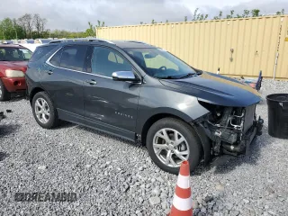 2019 Chevrolet Equinox Premier z VIN 2GNAXNEV5K6302984, wystawiony jako Copart lot #56033935 z przebiegiem 59 554 mil mil oraz Szkoda całkowita • Salvage title. Historia ofert i sprzedaży dostępna na DreamBid. Obrazek 4.