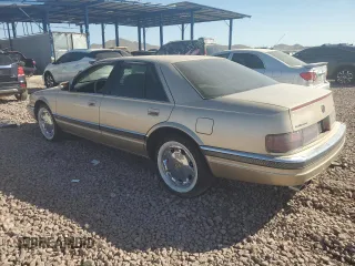1996 Cadillac Seville Luxury SLS z VIN 1G6KS52Y9TU831614, wystawiony jako Copart lot #73215144 z przebiegiem 119 461 mil mil oraz Czysty tytuł • Clean title. Historia ofert i sprzedaży dostępna na DreamBid. Obrazek 2.