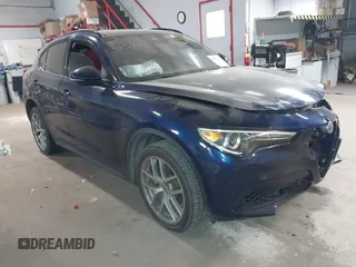 2019 Alfa Romeo Stelvio Ti Sport z VIN ZASPAKBN4K7C31744, wystawiony jako IAAI lot #41280654 z przebiegiem 56 775 mil mil oraz . Historia ofert i sprzedaży dostępna na DreamBid. Obrazek 1.