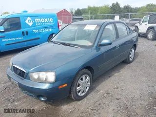 2003 Hyundai Elantra GLS with VIN KMHDN45D93U613247, listed as a IAAI auction lot 42095197 with 139,748 mi miles. Bid and sale history available at carsss.com. Image 2.