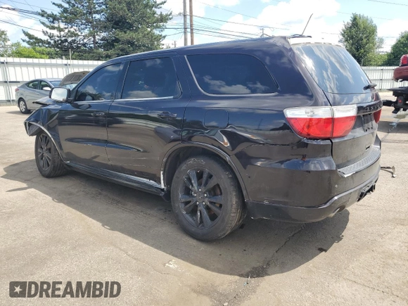 2013 Dodge Durango R/T with VIN 1C4SDJCT1DC672338, listed as a Copart auction lot 61544445 with 203,404 mi miles and Salvage title. Bid and sale history available at DreamBid. Image 2.