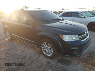 2015 Dodge Journey SXT with VIN 3C4PDCBBXFT595132, listed as a IAAI auction lot 41513366 with 197,301 mi miles. Bid and sale history available at carsss.com. Image 1.