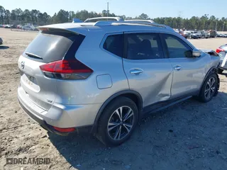 2019 Nissan Rogue SV with VIN JN8AT2MT9KW263300, listed as a IAAI auction lot 41853629 with 104,654 mi miles. Bid and sale history available at carsss.com. Image 4.
