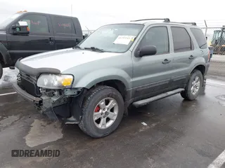 2006 Ford Escape XLT with VIN 1FMYU03126KC55897, listed as a IAAI auction lot 41733243 with 136,989 mi miles. Bid and sale history available at carsss.com. Image 18.