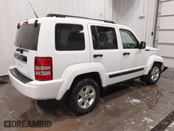 2011 Jeep Liberty Sport with VIN 1J4PN2GKXBW520106, listed as a IAAI auction lot 41900011 with 137,546 mi miles and . Bid and sale history available at DreamBid. Image 4.