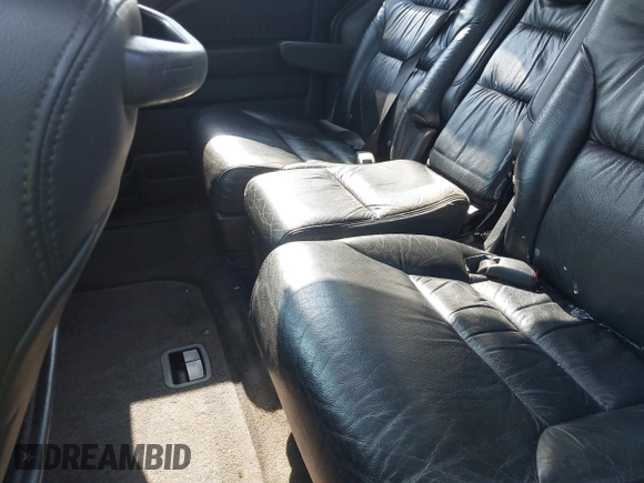 2010 Honda Odyssey Touring with VIN 5FNRL3H97AB104359, listed as a IAAI auction lot 42555872 with 233,952 mi miles and . Bid and sale history available at DreamBid. Image 8.