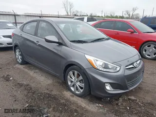 2014 Hyundai Accent GLS with VIN KMHCU4AE1EU771775, listed as a IAAI auction lot 41893787 with 98,011 mi miles. Bid and sale history available at carsss.com. Image 1.
