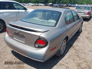 2000 Nissan Maxima GXE z VIN JN1CA31D0YT531421, wystawiony jako IAAI lot #42197398 z przebiegiem Nie podano mil oraz . Historia ofert i sprzedaży dostępna na DreamBid. Obrazek 4.
