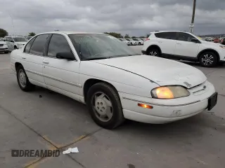 1997 Chevrolet Lumina LS with VIN 2G1WL52M5V9107095, listed as a Copart auction lot 73659954 with 135,669 mi miles and Salvage Title. Bid and sale history available at DreamBid. Image 4.