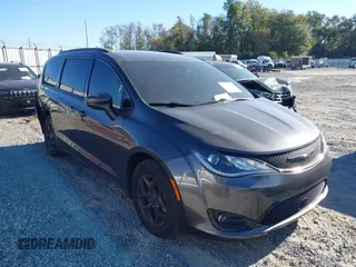 2020 Chrysler Pacifica Touring with VIN 2C4RC1FG1LR245764, listed as a IAAI auction lot 40646472 with 86,119 mi miles and . Bid and sale history available at DreamBid. Image 1.