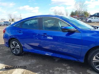 2017 Honda Civic EX-T with VIN 19XFC1E33HE028257, listed as a IAAI auction lot 41395356 with 51,154 mi miles and . Bid and sale history available at DreamBid. Image 13.