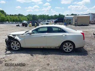 2014 Cadillac ATS Standard RWD with VIN 1G6AA5RA6E0171128, listed as a IAAI auction lot 42226859 with 90,308 mi miles and . Bid and sale history available at DreamBid. Image 14.