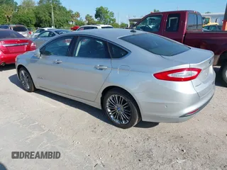 2013 Ford Fusion SE Hybrid with VIN 3FA6P0LU6DR127108, listed as a IAAI auction lot 42023529 with 250,057 mi miles. Bid and sale history available at carsss.com. Image 3.