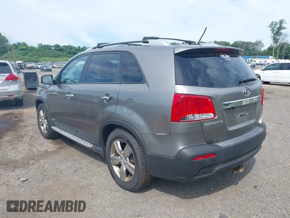 2012 Kia Sorento EX with VIN 5XYKUDA64CG255711, listed as a IAAI auction lot 42625704 with 149,625 mi miles and . Bid and sale history available at DreamBid. Image 3.